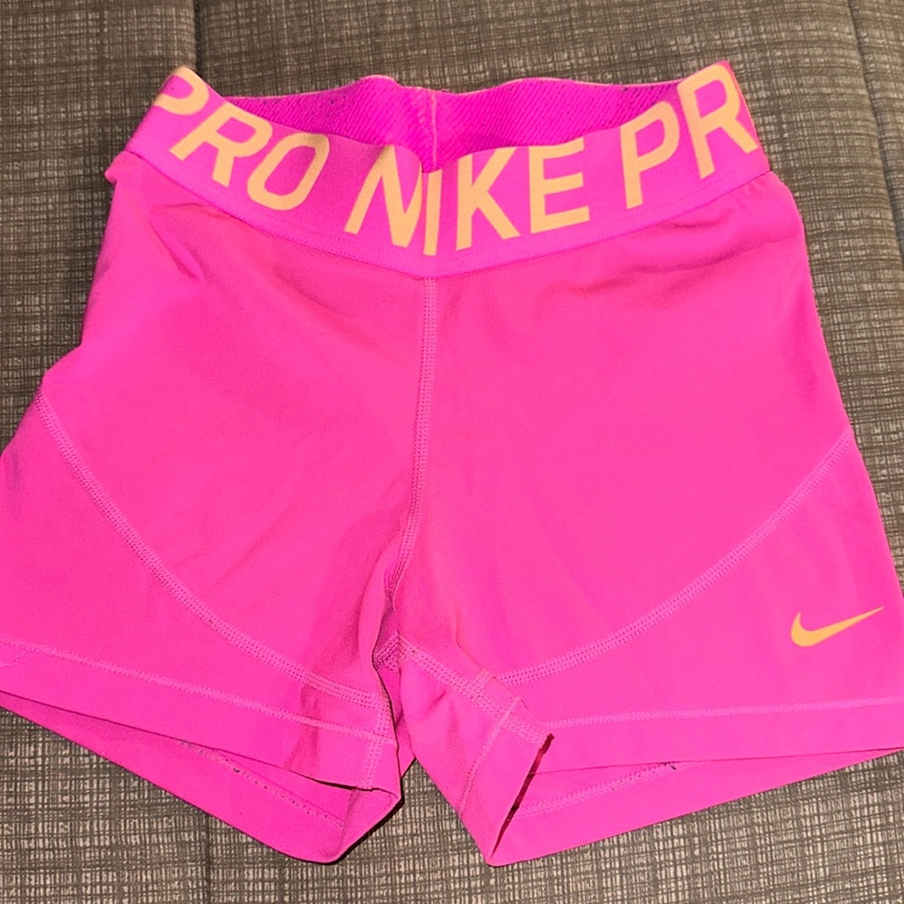 Pink Nike pro spandex shorts